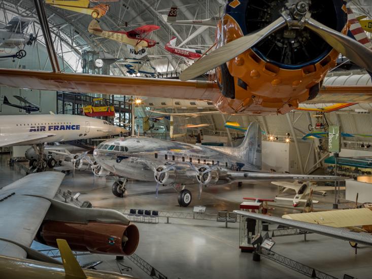 Silver painted commercial airplane displayed at the museum. 