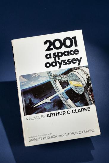 A book titled 2001 A Space Odyssey with a spacecraft on the cover.