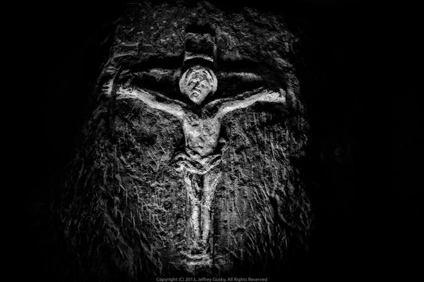 Figure of Jesus on the cross engraved on stone. 