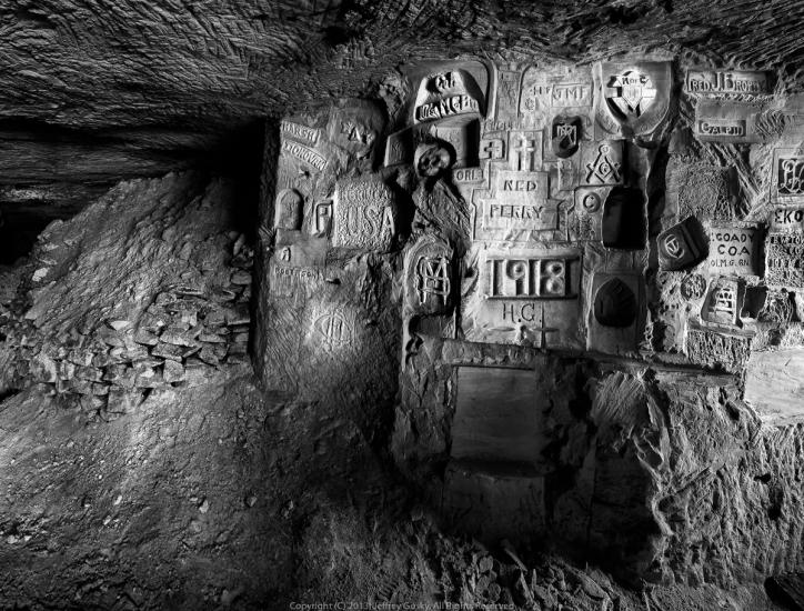 Carvings against stone. 