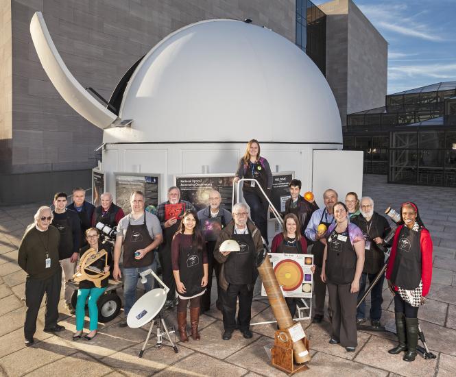 Staff and volunteers outside of the Phoebe Waterman Haas Public Observatory. 