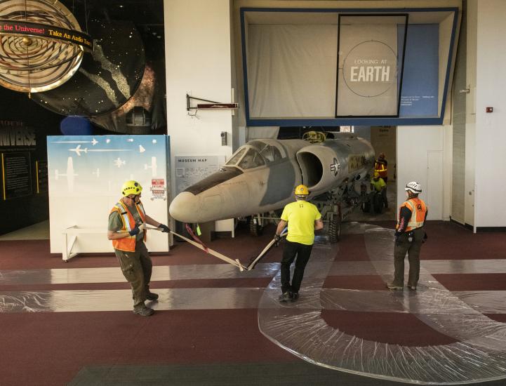 Contractors hand-tow the Lockheed U-2 fuselage.