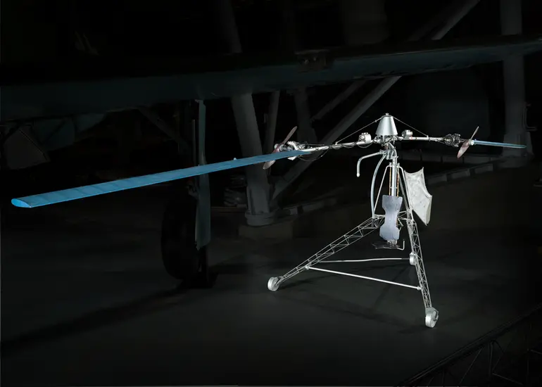 Two propellers attached to a metal frame. 