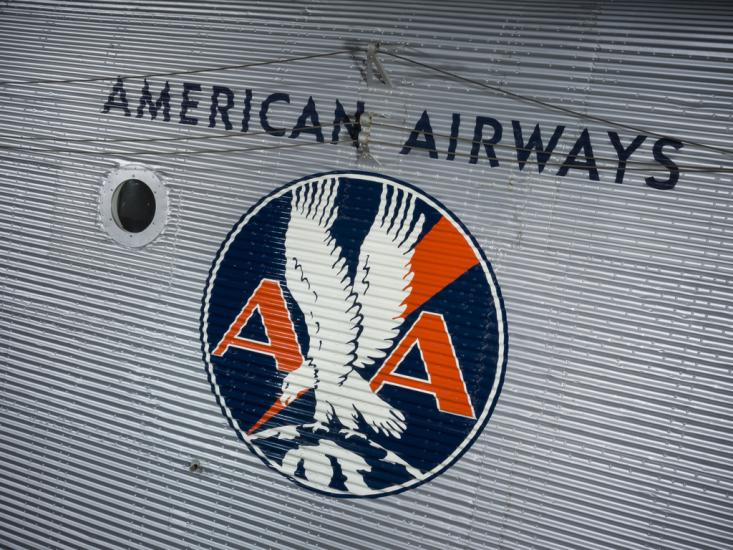 Close up image of an American Airways logo painted on a plane. 