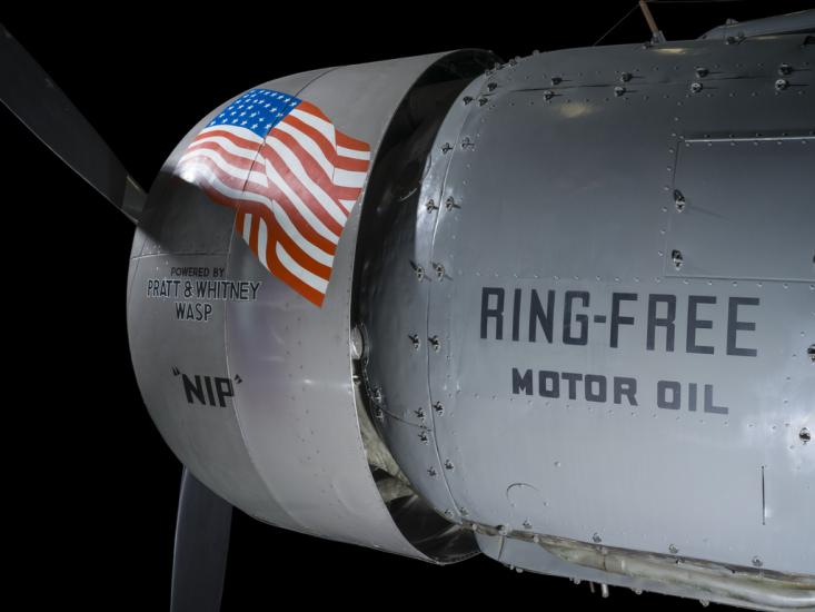 View of an engine and propeller of an airplane. 