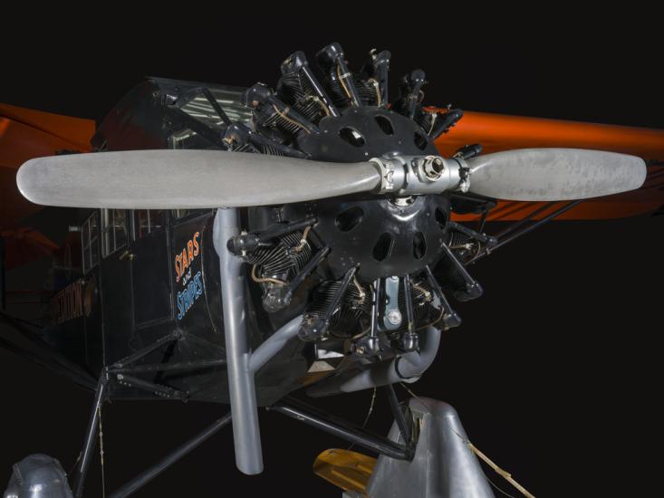 Close up image of a propeller and engine of an airplane. 