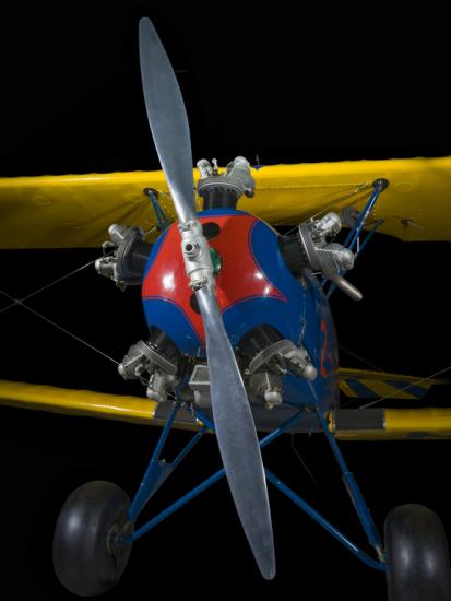 Propellers painted to a yellow and blue biplane. 