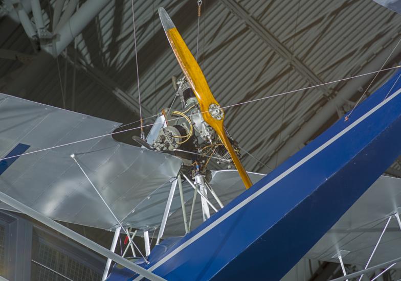 Close up view of an engine and propellers. 