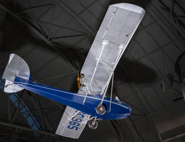 View of a blue painted fuselage on an airplane. 