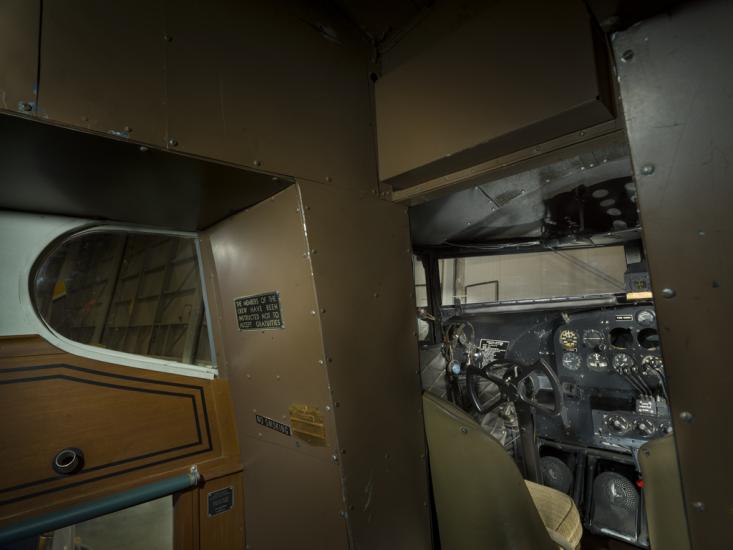 View of the cabin and cockpit of a plane. 