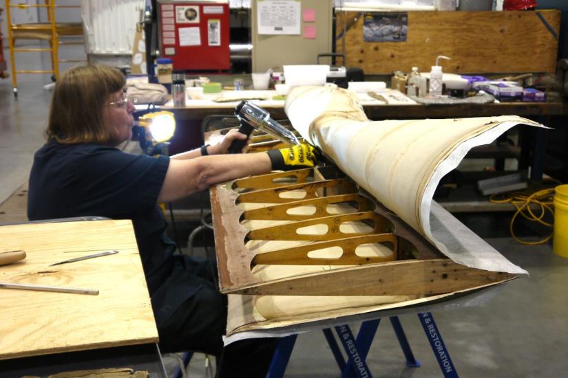 Conservator working on Flak-Bait