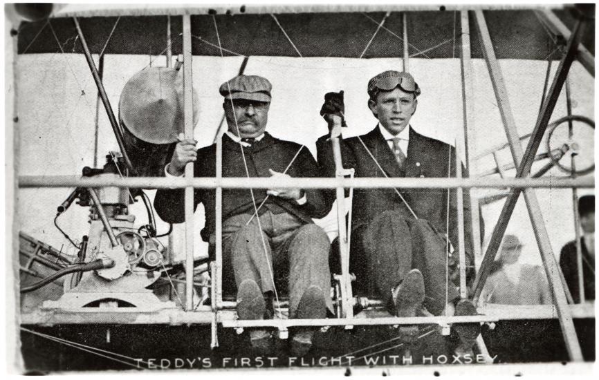 President Theodore Roosevelt (left) and pilot Arch Hoxsey (right) seated in Hoxsey's Wright (Co) Type AB.