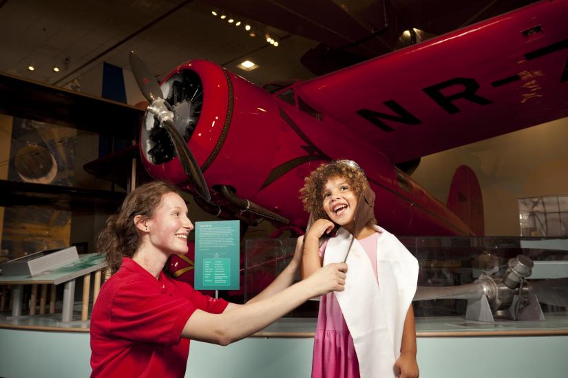 Museum Explainer with Young Visitor