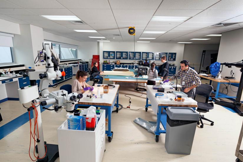 Two conservators work in the lab. 