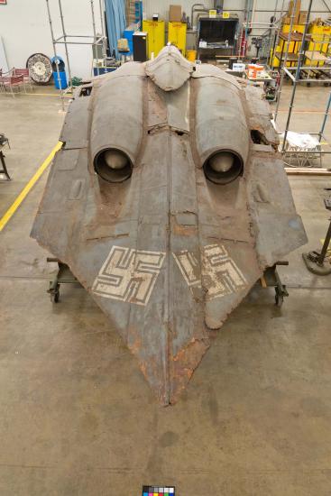 Aft view of the Horten Ho 229 V3, a gray World War II-era aircraft with white swastikas.