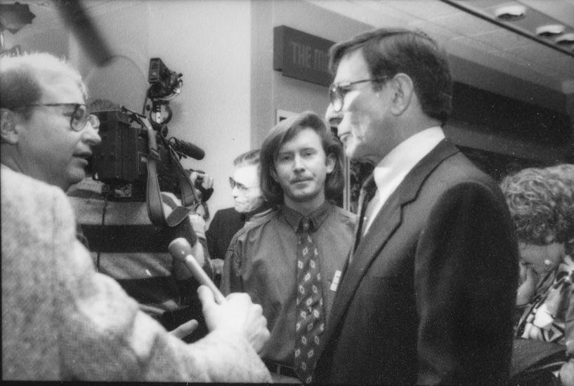 Leonard Nimoy, a white man, visits the opening of the Museum's Star Trek Exhibit in 1992. A member of museum staff is with him to escort Nimoy to museum events.