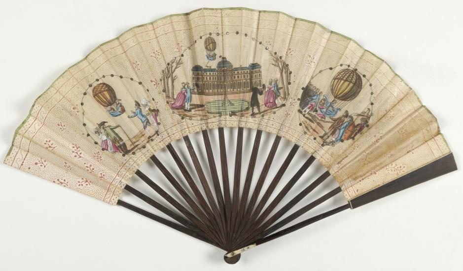 Decorative fan with three pieces of artwork depicting the first hydrogen balloon. 