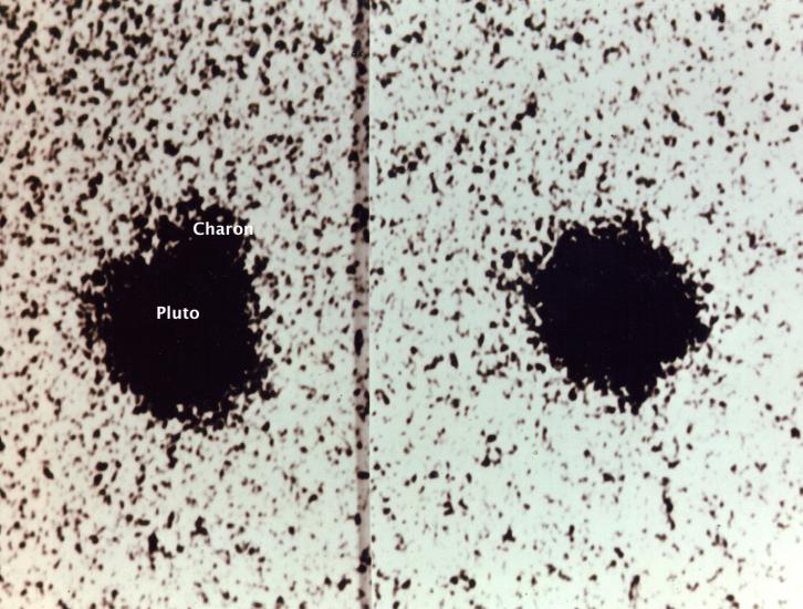 Telescopic view of Pluto and one of its moons, Charon. This was taken at the first discovery of Charon, which is visible as a tiny dot with its name labeled under the view.