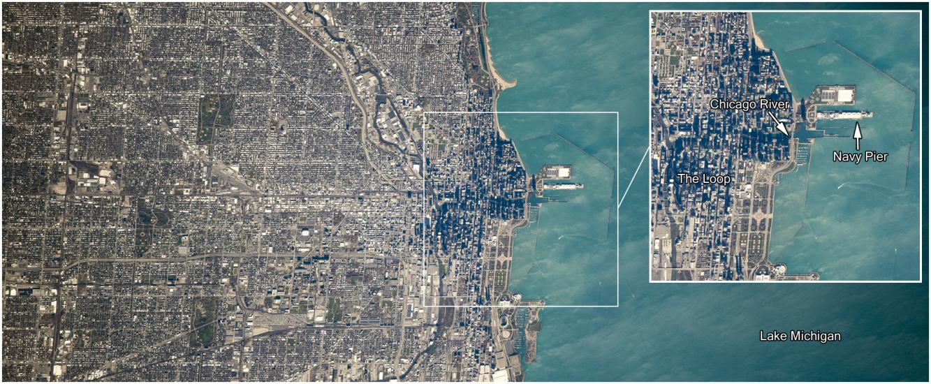 Satellite view of the city of Chicago and the adjacent Lake Michigan. A close-up panel shows the city in further detail.