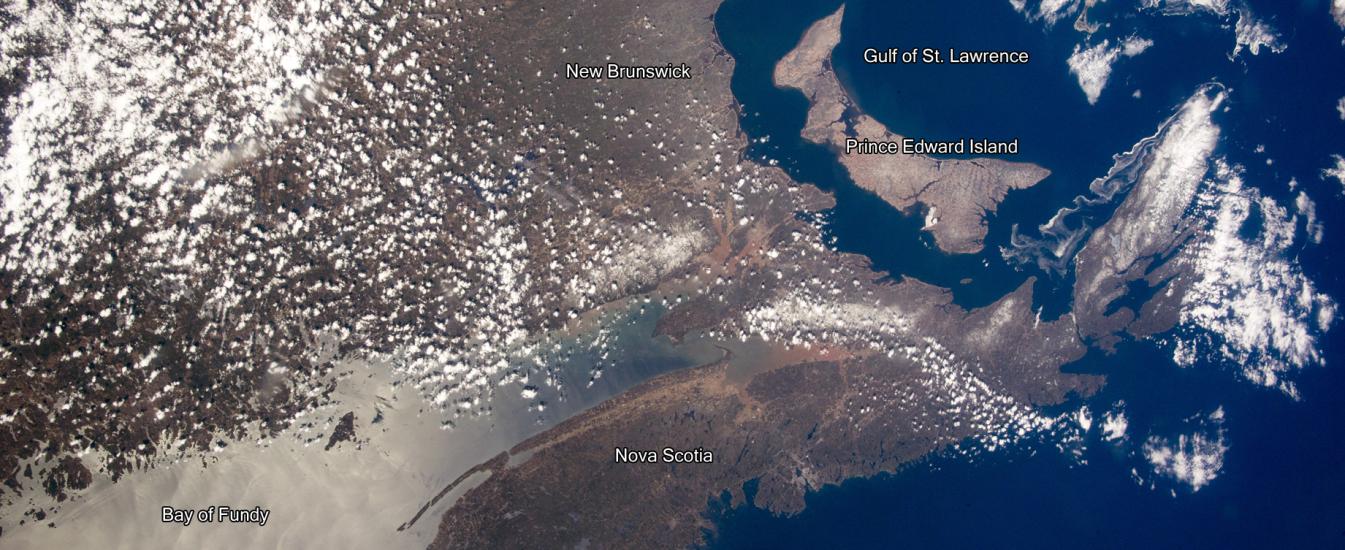 Satellite view of the eastern coast of Canada and surrounding bodies of water.