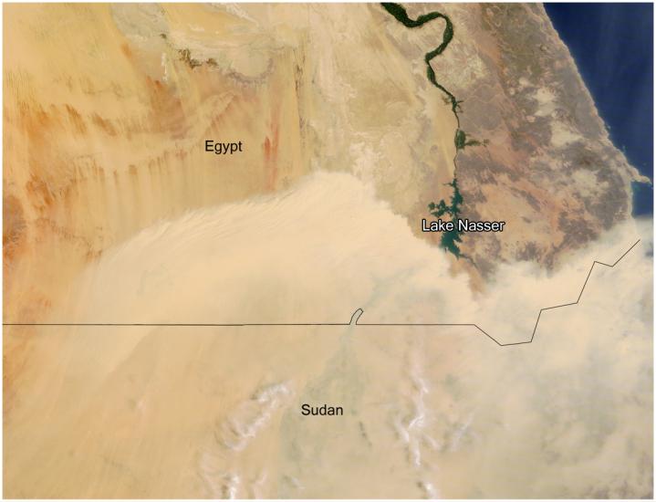 Satellite view of the deserts of southern Egypt and northern Sudan, where a dust storm is visible on the satellite.