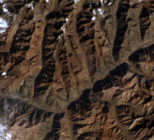 Satellite view of a set of brown mountains that are part of the Andes Mountain Range in Argentina.