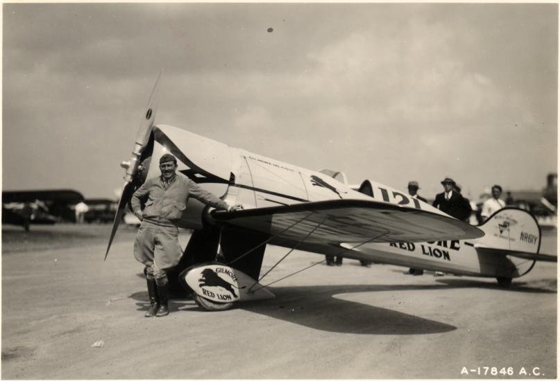 Col. Roscoe Turner Posing with Racer