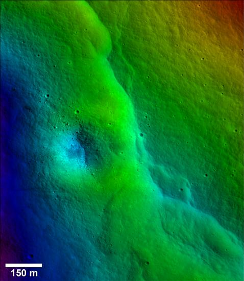 Colored topographic map of a portion of the Moon with a fault scarp visible as a line of dark greens (higher elevations) correspond with an immediate dip into lower elevations (highlighted in lighter greens).