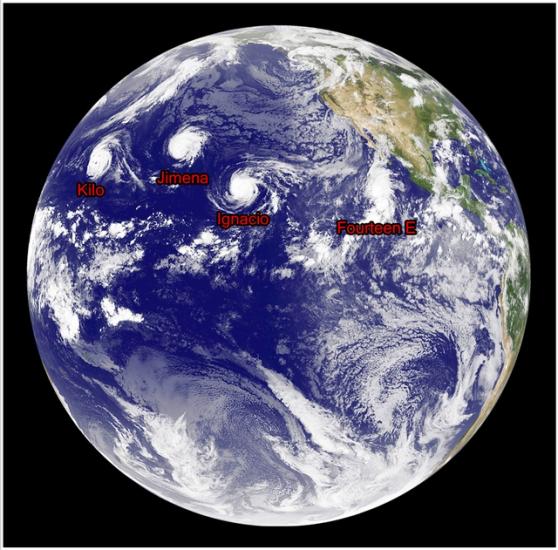 Disk view of the Earth focusing on the Pacific Ocean. Four tropical cyclones are labeled with their names in red text.