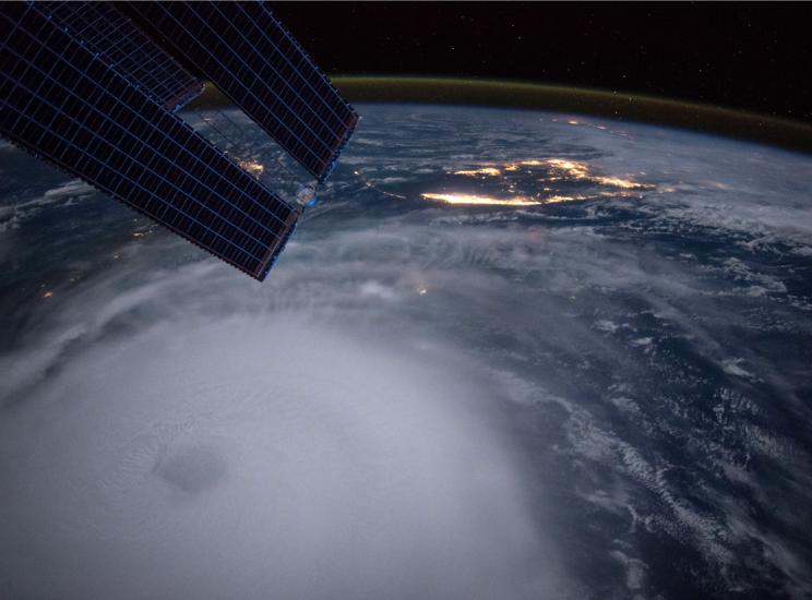 Satellite-style, nighttime view of a large hurricane in the Atlantic Ocean.