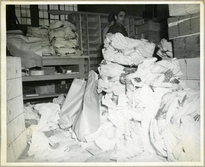 View of several turkeys stacked as part of the Northwest Aeronautical Corporation's giveaway during the 1945 holiday season.