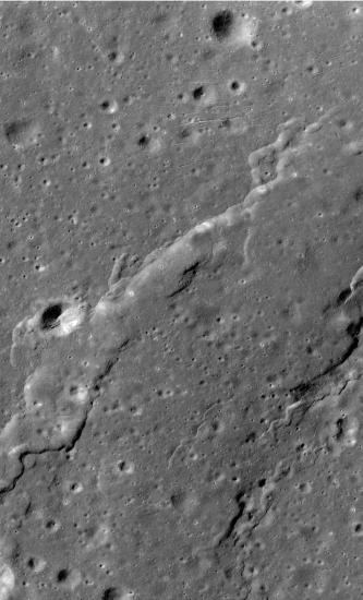 Small areas of troughs created from stretching lunar crust on the Moon. They are most visible in the upper half of the perspective.