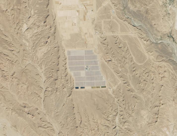 Satellite view of a solar power plant in a large desert in Morocco.