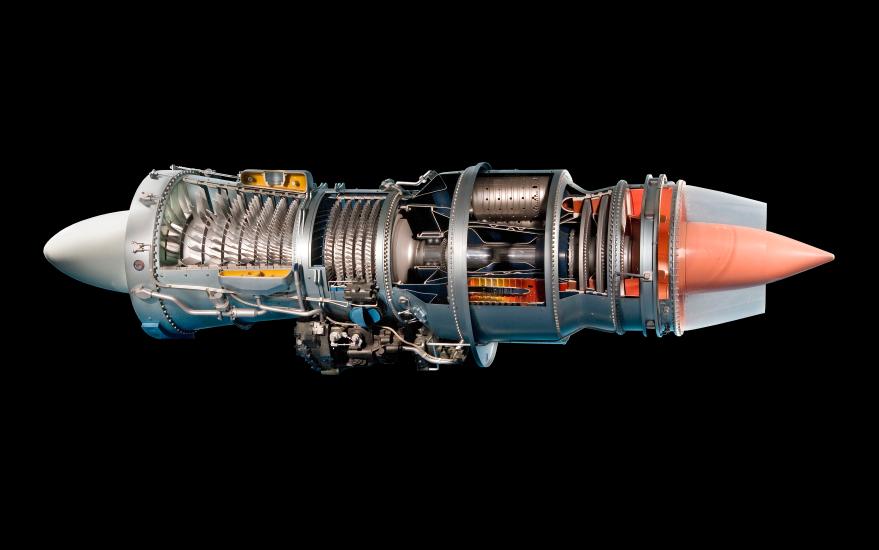 Engine scale model with two cylinders attached together and long tipped parts at each end.