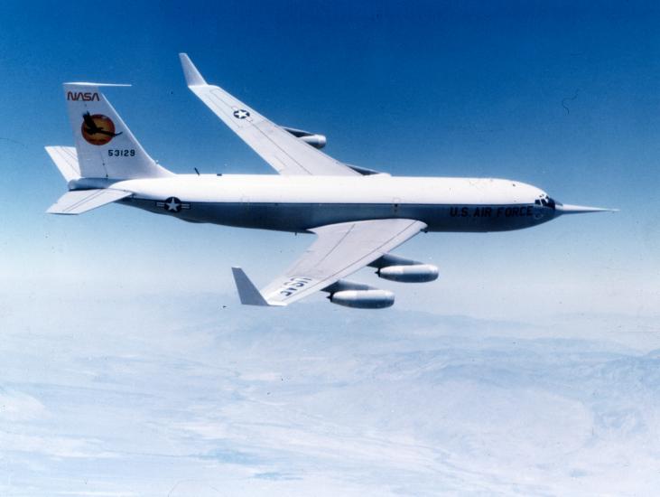 An aircraft performs testing with vertical tips called winglets at the end of both wings. The aircraft is in flight.