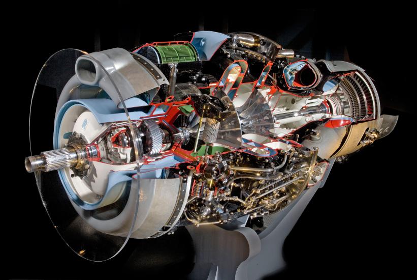 Single-cylinder engine with a clear cutaway showing the various components of the engine.