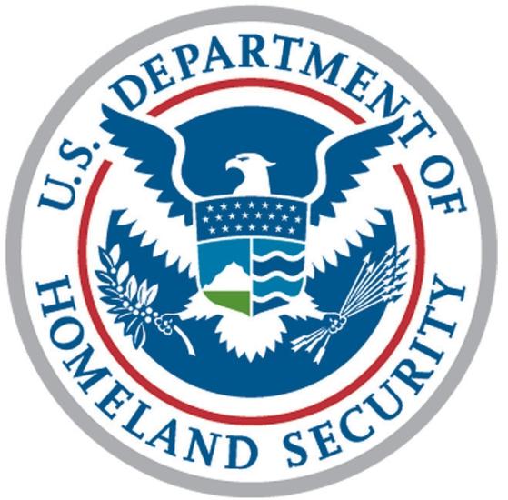 Circular logo with "U.S. Department of Homeland Security" in outer circle while an eagle holding an olive branch and arrows flies in the inner circle.