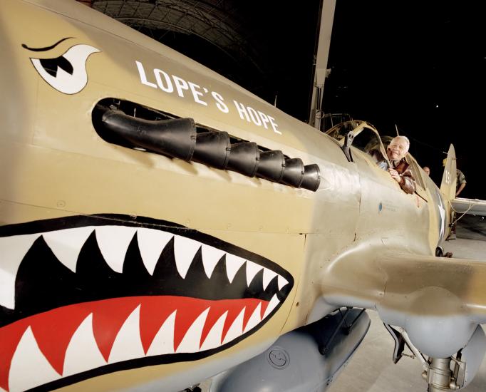 Don Lopez in cockpit of Curtiss P-40