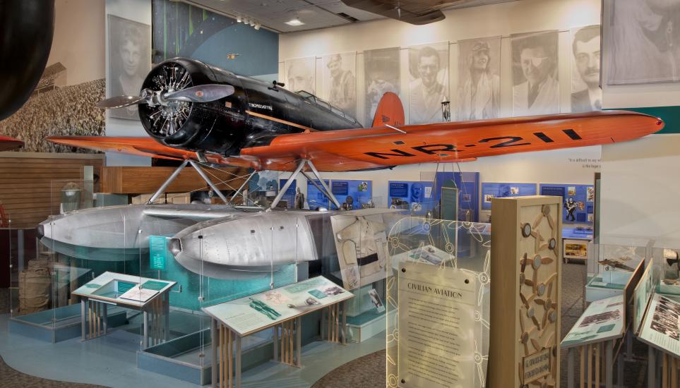 Low-wing monoplane with pontoon floats shown on exhibit