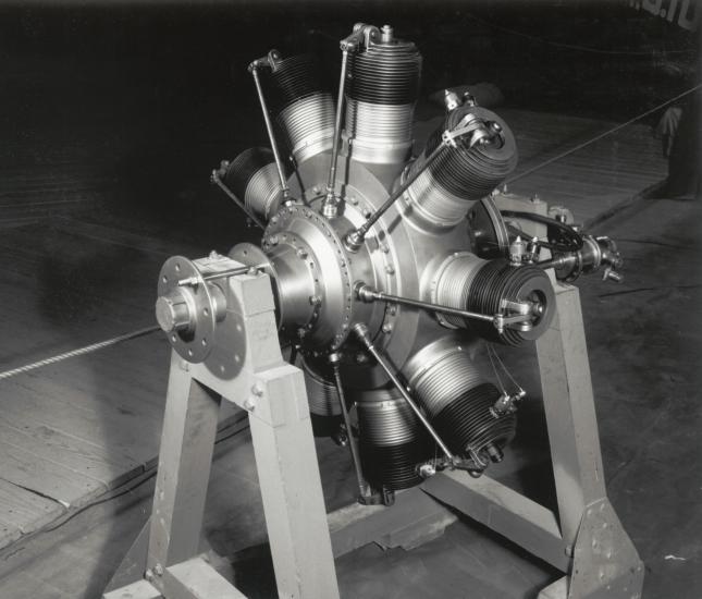 Black and white photos of Gnome rotary engine on display stand