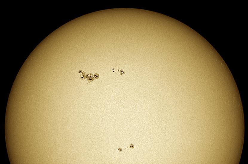 Partial disk view of the Sun highlighting a sunspot which has transformed into a solar flare.