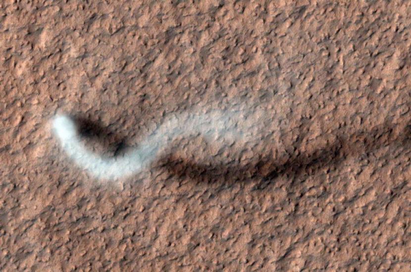 A large dust devil above the surface of Mars.