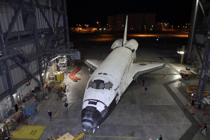 The Space Shuttle Discovery is moved out of the vehicle assembly building prior to its transport to the Udvar-Hazy Center.