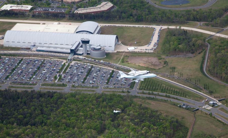 Space Shuttle Discovery Flies over the Udvar-Hazy Center prior to its delivery to the Udvar-Hazy Center.