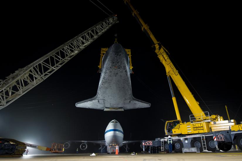 The Space Shuttle Discovery is unattached from the modified Boeing 747 used to transport the shuttle.