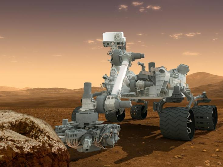 An artist's depiction of the Curiosity Rover performing examination tasks on a rock on Mars.