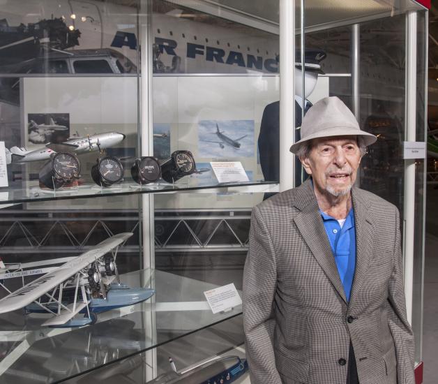 Bruce Del Mar with Donated Artifacts