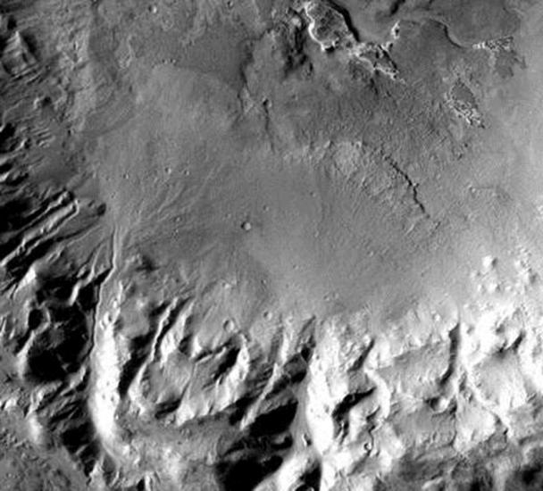 Satellite view of alluvial fans on Mars, which are areas of sediment which are deposited away from geographic features such as rivers.