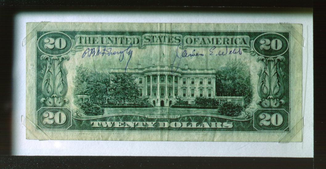 Back of a twenty dollar U.S. bill which was signed by Dr. George B. Kistiakowsky and James E. Webb.