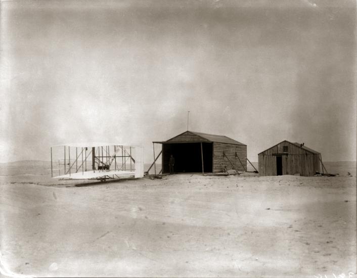 Wilbur Wright with 1903 Flyer